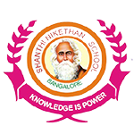 Shanthi Nikethan School logo